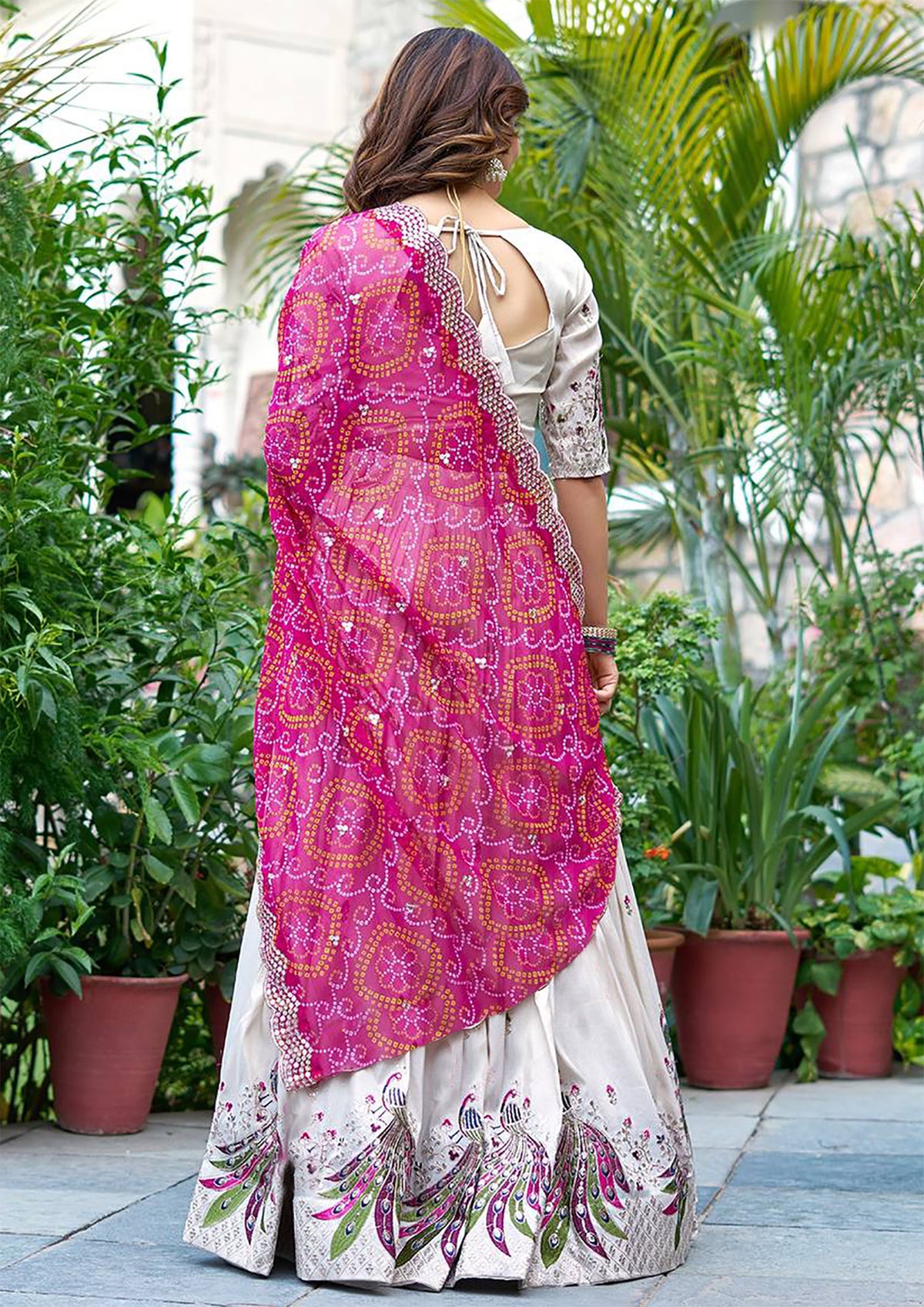 Aakrish Designers Pecock Embellished Semi Stitched Lehenga Choli white